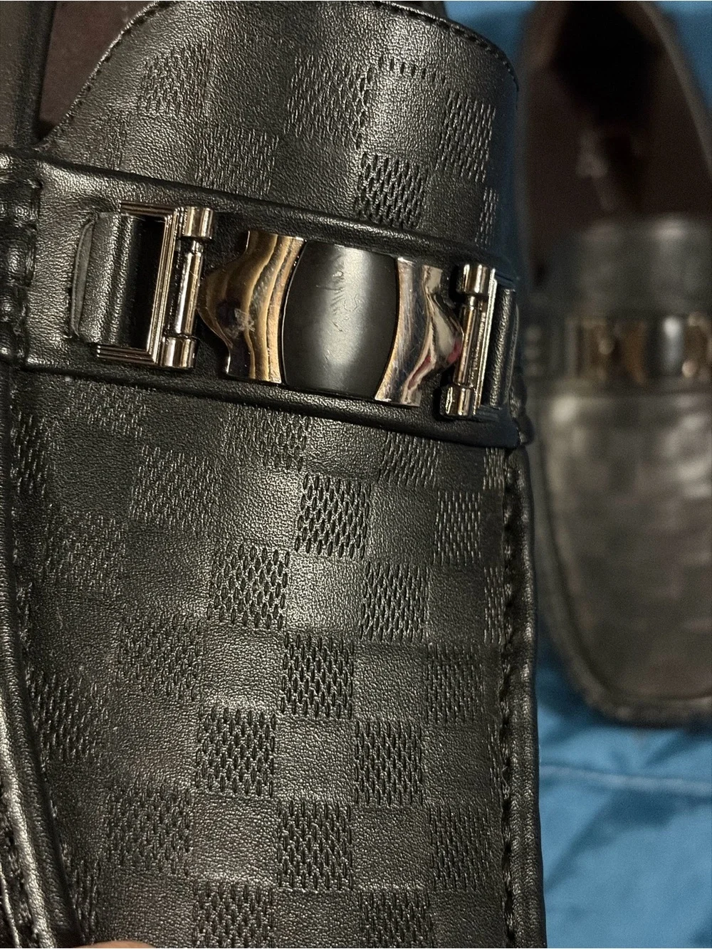 Men's black slip-on loafers with silver tone decorative bit